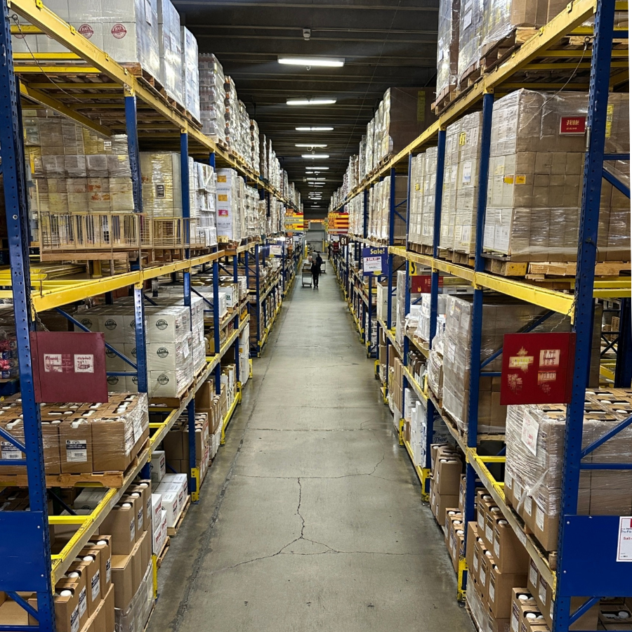 Canton Food Co. warehouse aisle stocked with weekly featured items